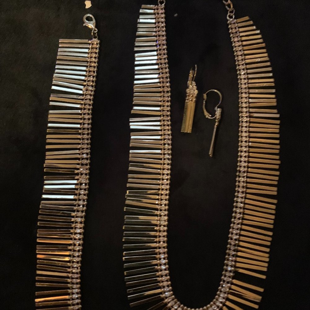 Gold tone necklace, bracelet, and earrings